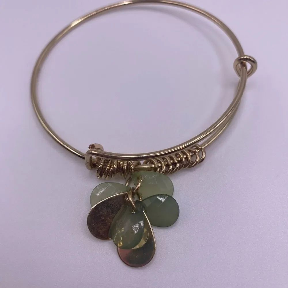 4/$20 Gold tone bangle with floating green beads